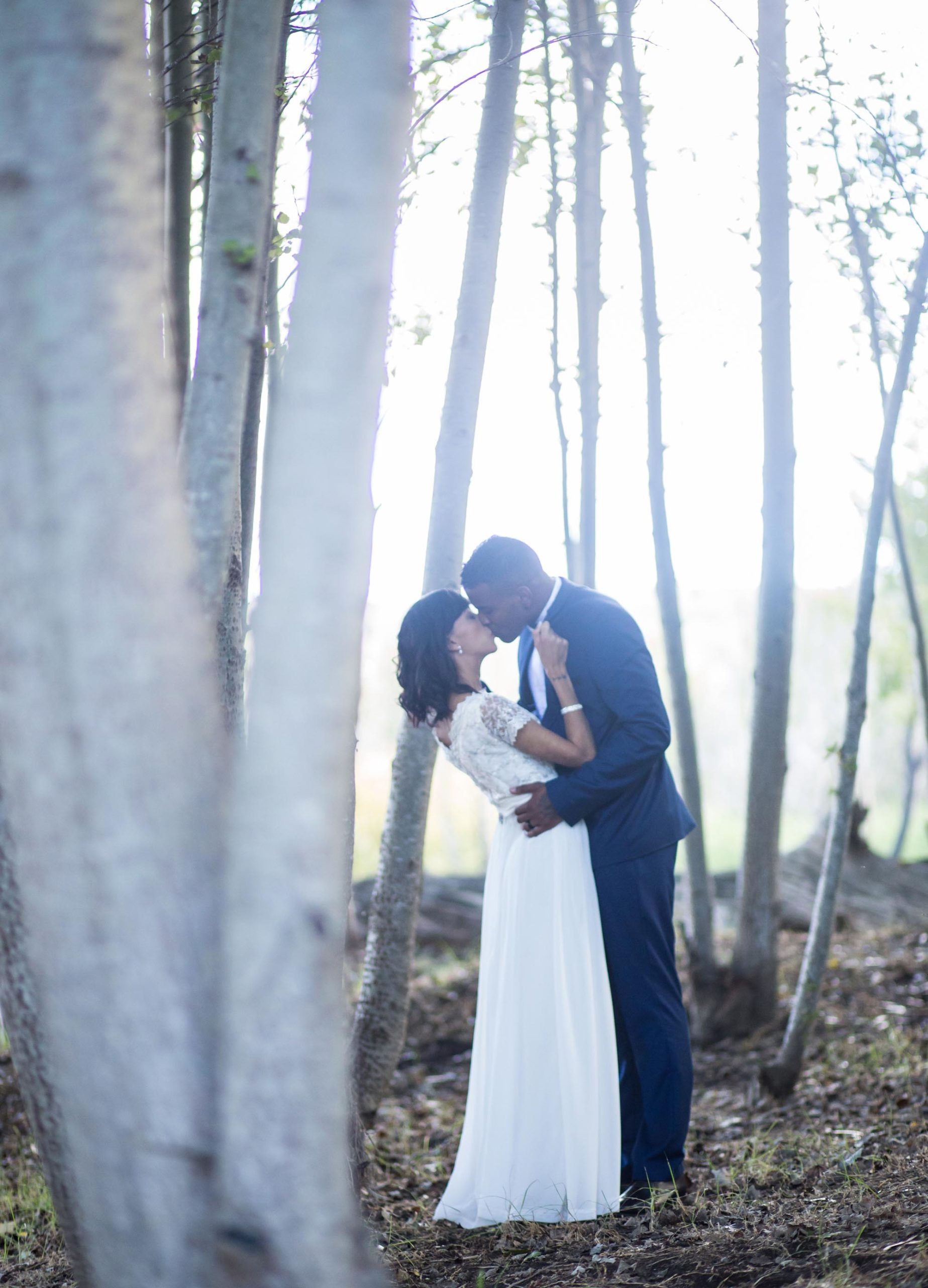 wedding kiss in a forest
